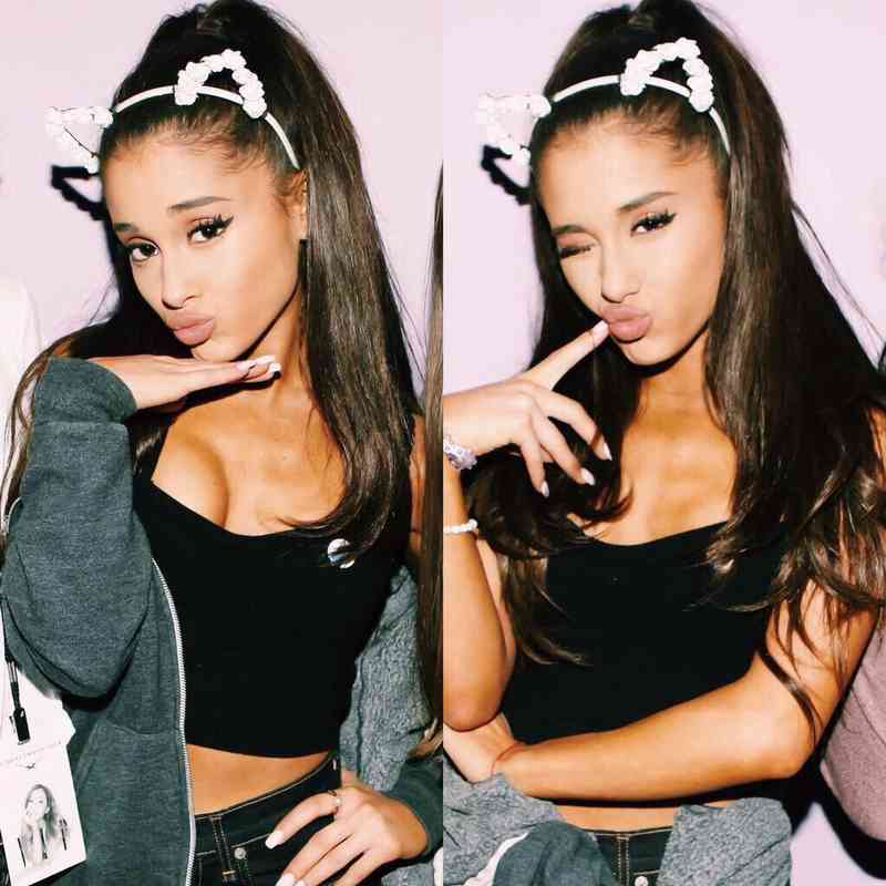 13 "Classic Ariana" With Sultry Pout And Cute Cat Ears.